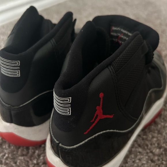 Jordan Black and Red Sneakers - Picture 1 of 3